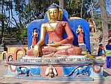 Kathmandu Swayambhunath 08 Buddha Statue At Entrance Gate